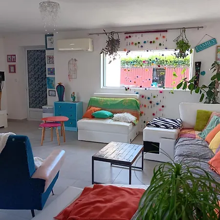 Prázdninový dům La Maison Multicolore *